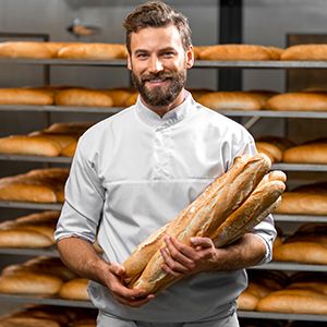 Baker holding bread